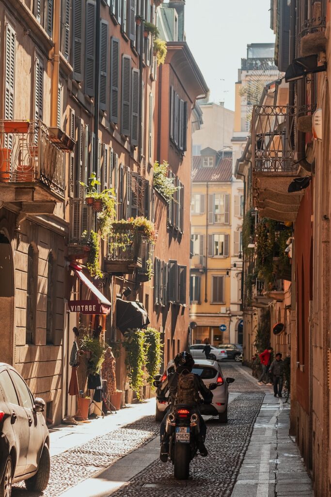 Cobblestone streets lined with charming boutiques in Brera District, Milan