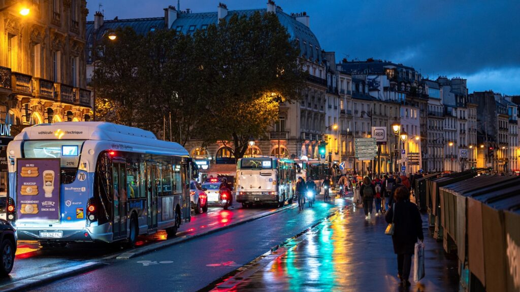 The Paris bus system serves as a convenient and accessible public transportation option, complementing the Metro by reaching areas the subway doesn't cover, allowing locals and tourists alike to explore the city with ease.